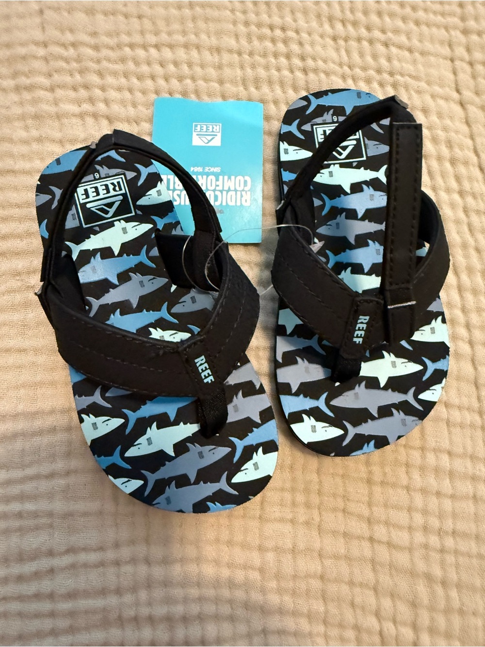Reef baby size 6 Black Shark-Print Flip Flops